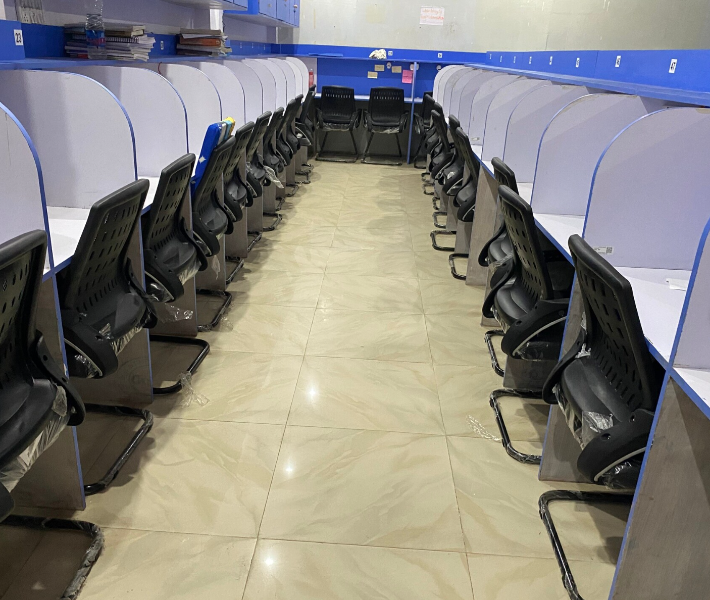 Neat rows of study desks at Caliber Library
